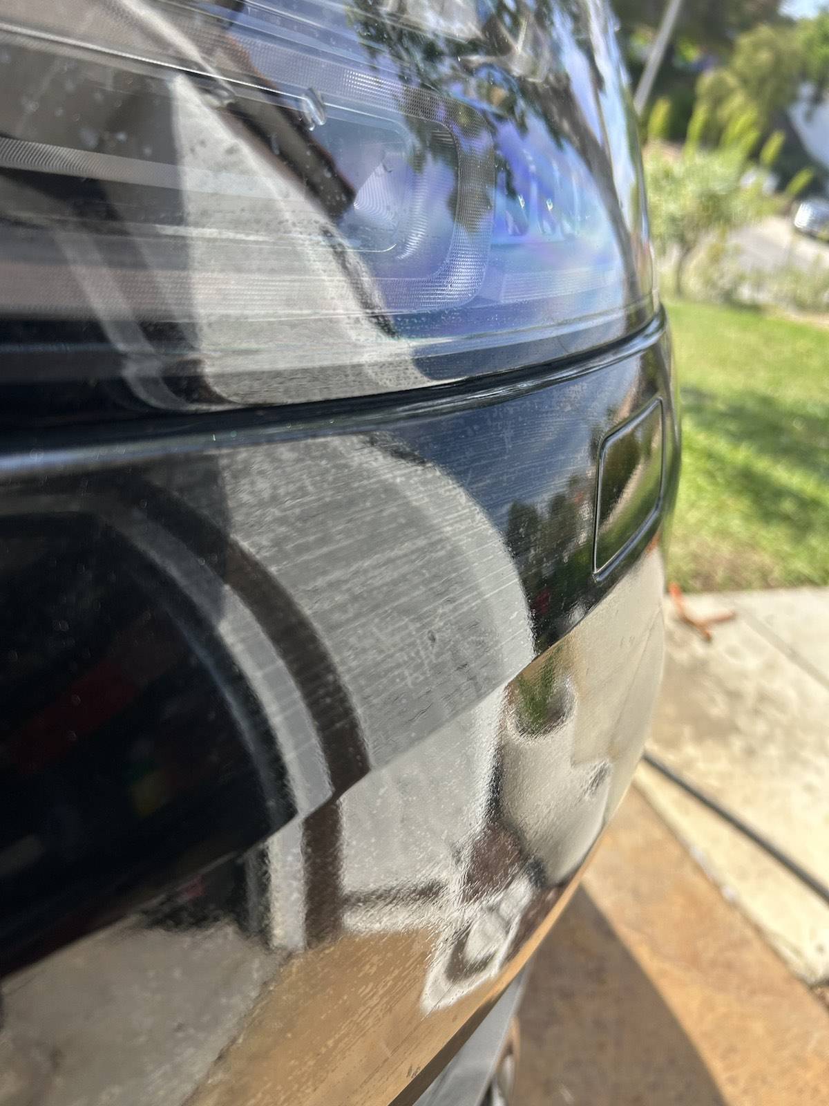 Mirror-gloss black paint after polishing and paint correction