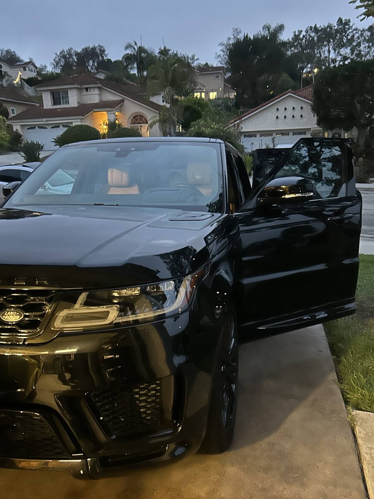 Black Land Rover detailed to a deep gloss finish in North County San Diego